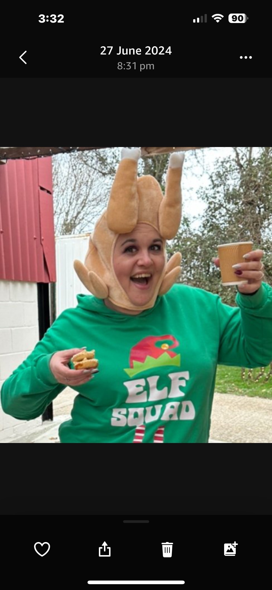 Volunteer in elf costume at Christmas Wishes event